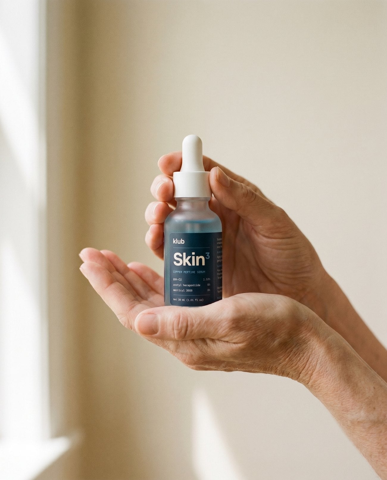 Skin³ held in hand